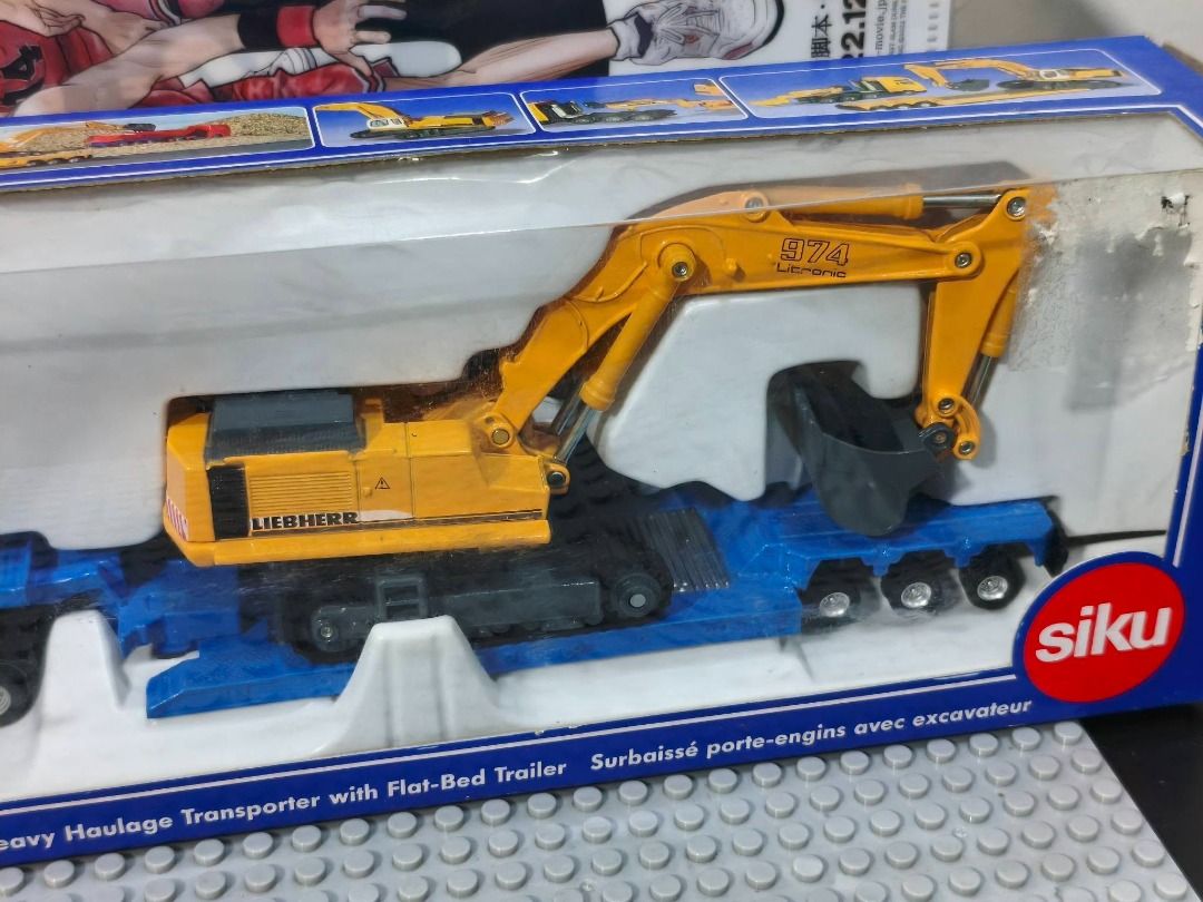 Heavy Haulage with Loader - Siku (Category: Vehicle & Diecast Models) located in Caloocan City. Submitted by dcollectibles (Listing ID 1454113526, Image 3). Description: - As is Condition, WYSIWYG - Actual Picture posted - Tondo, Manila - Lalamove, LBC (by schedule) - PM for more information - GCash only For more items availability visit us at FB (DEKAI Collectibles) Thank you!.