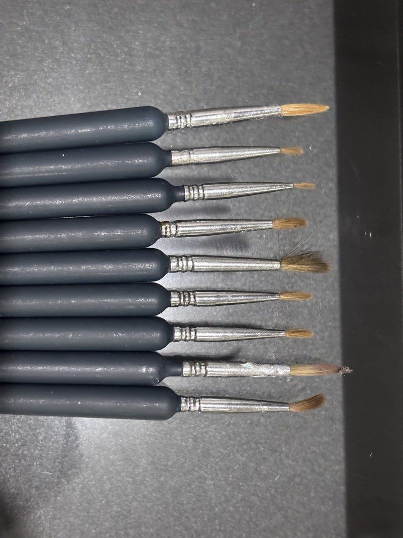 Hokka Paint Brushes (Category: Craft Supplies & Tools) located in Antipolo. Submitted by stephentab38127 (Listing ID 1454126173, Image 2). Description: - Set of 9 paint brushes - Black handles with silver ferrules - Fine brush tips, ideal for detailed work - Suitable for art projects and crafts - Condition varies: some lightly used, others appear new.