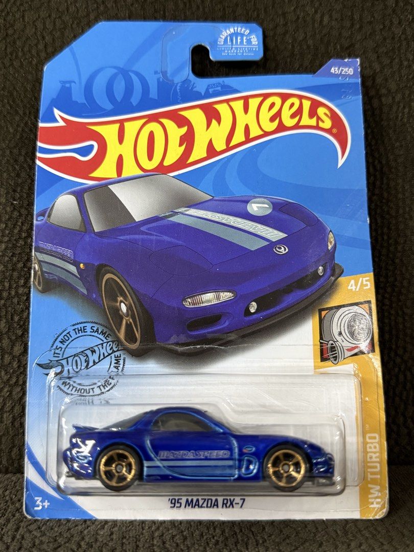 Hot Wheels '95 Mazda RX-7 (Category: Vehicle & Diecast Models) located in Muntinlupa City. Submitted by eman_garcia_ (Listing ID 1454163966, Image 1). Description: - Hot Wheels '95 Mazda RX-7 - Color: Blue - Series: HW Turbo - Card Condition: Good - Perfect for collectors!.