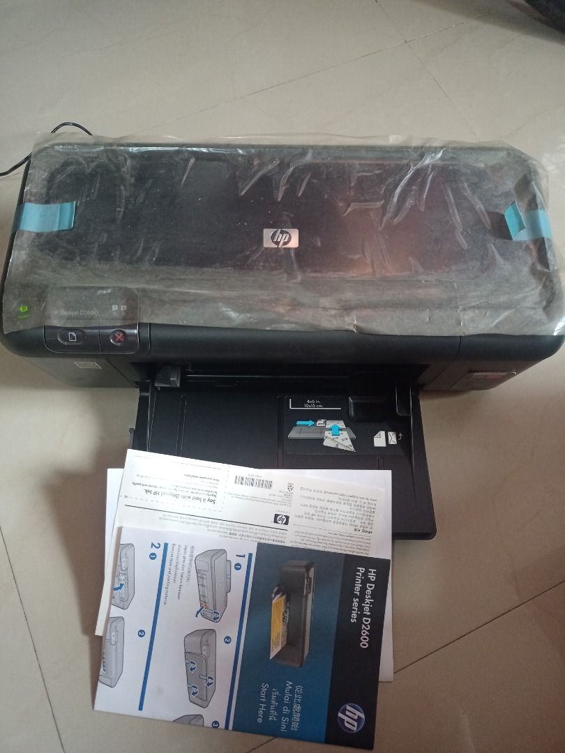 HP Deskjet D2660 (Category: Printers, Scanners & Copiers) located in Quezon City. Submitted by smorgasbord23 (Listing ID 1454062766, Image 1). Description: Please read: Full disclosure: Item was last used about 10 years ago. Rarely used. Nakadikit pa yung plastic cover sa taas ng printer. Naubusan lang ng ink. Meron ata sa s-h-o-p-e-e mura-mura pero sa mall alam ko last time nagtanong kami medyo mahal. But again, that was years ago. Meron na kami