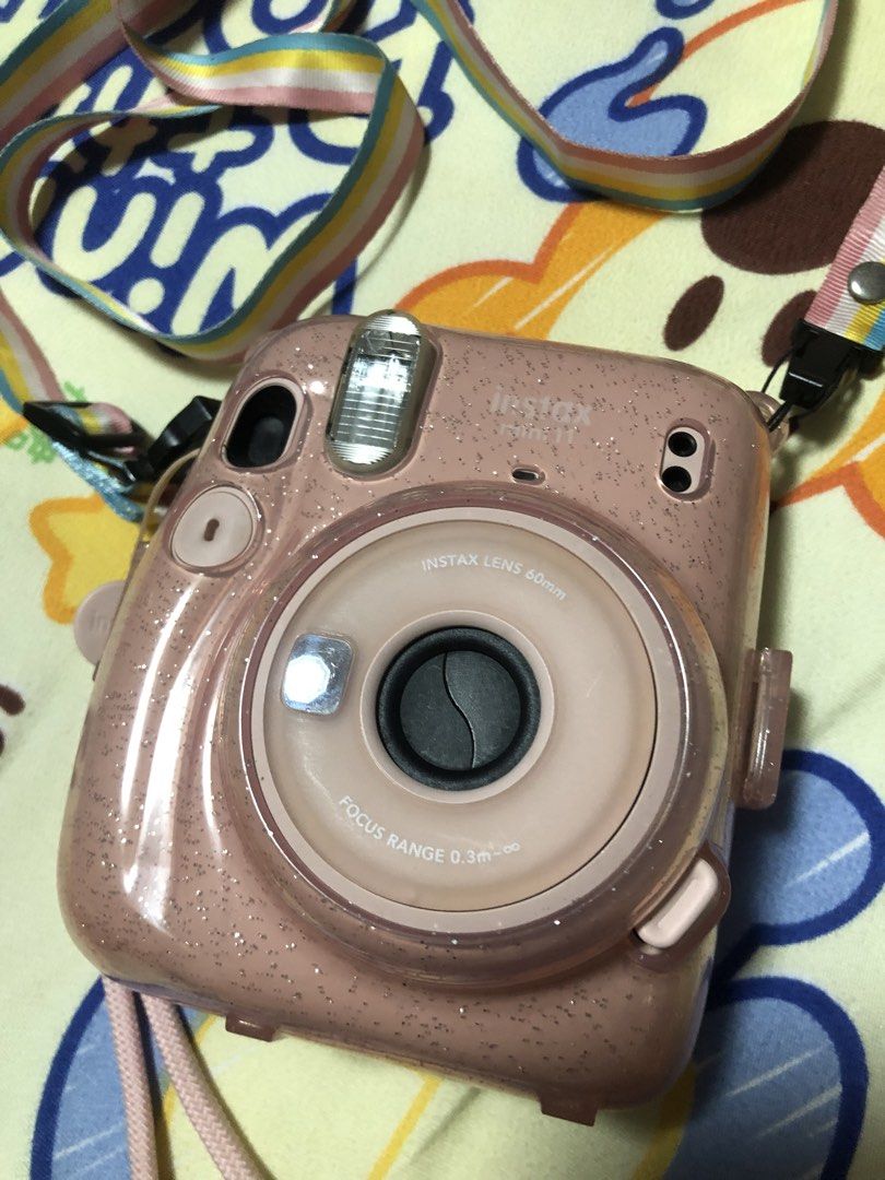 InstaX Mini 11 with Case (Category: Cameras) located in San Nicolas. Submitted by coleeein (Listing ID 1454131029, Image 2). Description: Authentic InstaX Pink with Cover and lace Lightly used Without films RFS: Tambak na lang.