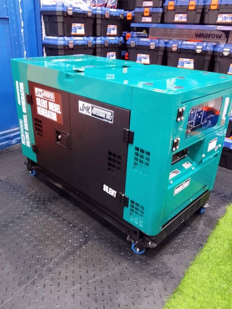 JRK Silent Diesel Generator (Category: Construction Tools & Equipment) located in Manila. Submitted by justineange628 (Listing ID 1454012572, Image 2). Description: - JRK Silent Diesel Generator - Color: Teal and Black - Equipped with wheels for easy portability - Control panel displays: Voltage, Current, Power Factor - Features: AC outlets and DC output - Ideal for backup power needs.