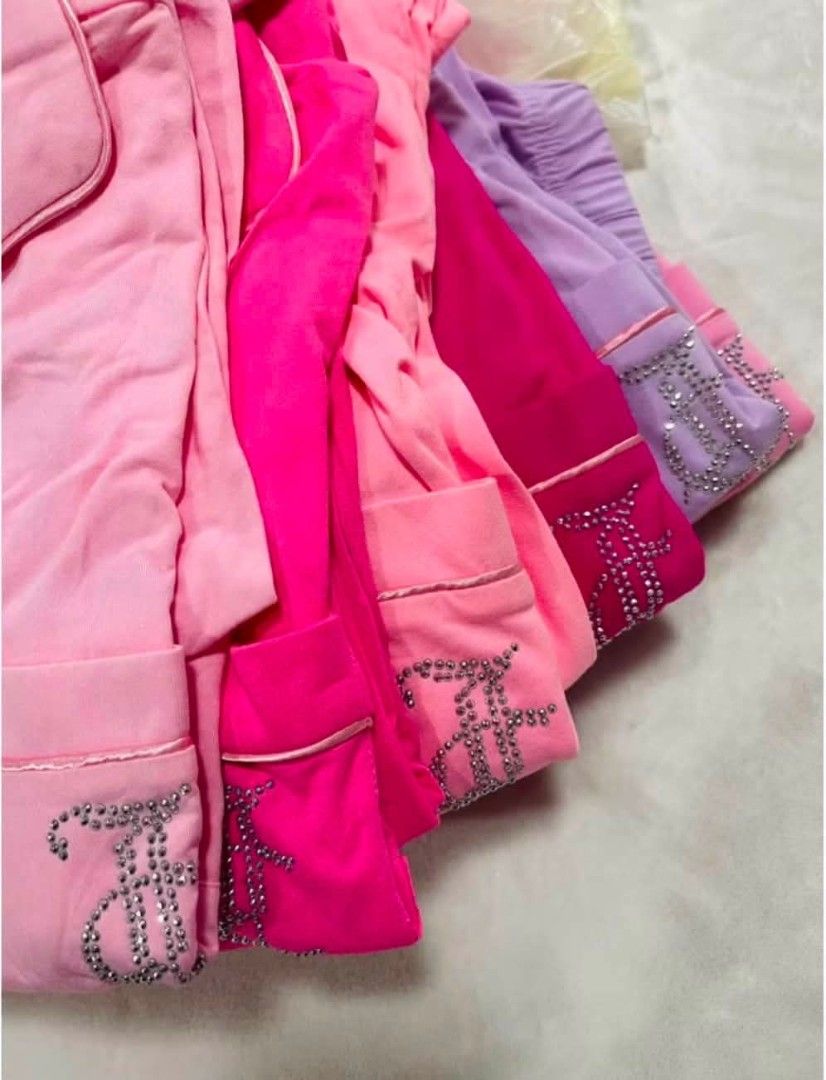 Juicy Couture Rhinestone Pajama Set - Multiple Colors (Category: Undergarments & Loungewear) located in Manila. Submitted by avenuefinds (Listing ID 1454036948, Image 3). Description: - Super cute Juicy Couture pajama sets - Features sparkly rhinestone details on the back and pocket - Available in pink, light pink, and light purple - Button-up top with collar and pocket - Matching pants included - Perfect for lounging in style and comfy glam.