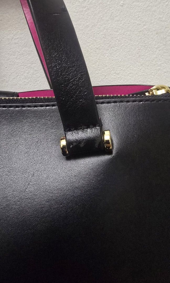 Kate Spade Pink Black Leather Bag (Category: Luxury Bags & Wallets) located in Quezon City. Submitted by ynnmyclosetph (Listing ID 1454120850, Image 2). Description: ✨ PRE-LOVED KATE SPADE NEW YORK STRUCTURED TOTE BAG ✨ Elegant, timeless, and perfect for everyday use. This beautiful Kate Spade New York Structured Tote features a sleek black leather exterior paired with a stunning pink interior ideal for work, meetings, or elevating your daily sty