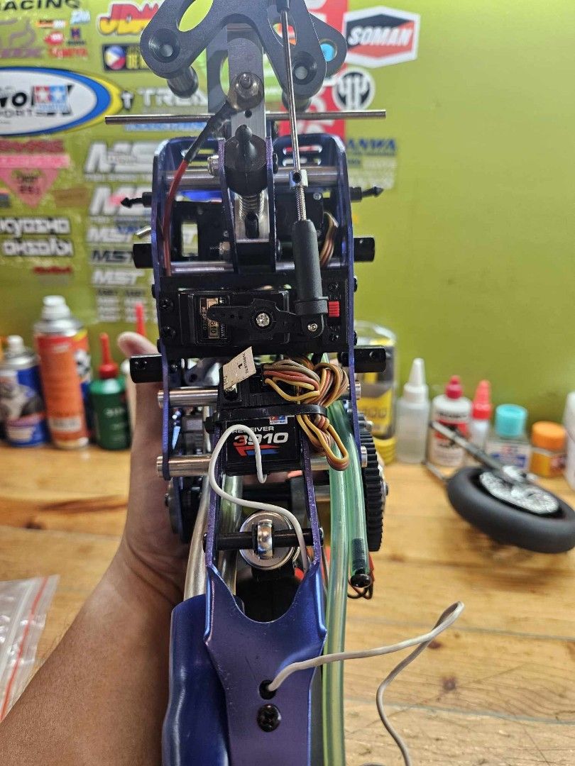 Kyosho R1100 RC Nitro Motorcycle (Category: Remote Control Toys) located in Caloocan City. Submitted by mjraymundo48160 (Listing ID 1454042297, Image 2). Description: - Kyosho R1100 RC Nitro Motorcycle - Highly detailed model with rider figure - Powerful nitro engine - Realistic chain drive system - Visible suspension and steering components - Perfect for collectors and hobbyists - Ready for thrilling RC action -35k neg.