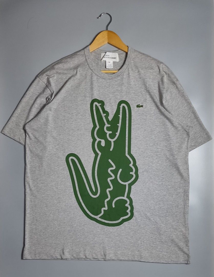 Lacoste x Comme des Garcons (Category: Luxury Apparel) located in Bolinao. Submitted by tokiya. (Listing ID 1454014961, Image 1). Description: LACOSTE x COMME des GARCONS BRAND NEW DEAD STOCK (Natanggal lang hang tag) Size XL fittings 24.5x31 Excellent Condition ‼️ No Issue ‼️.