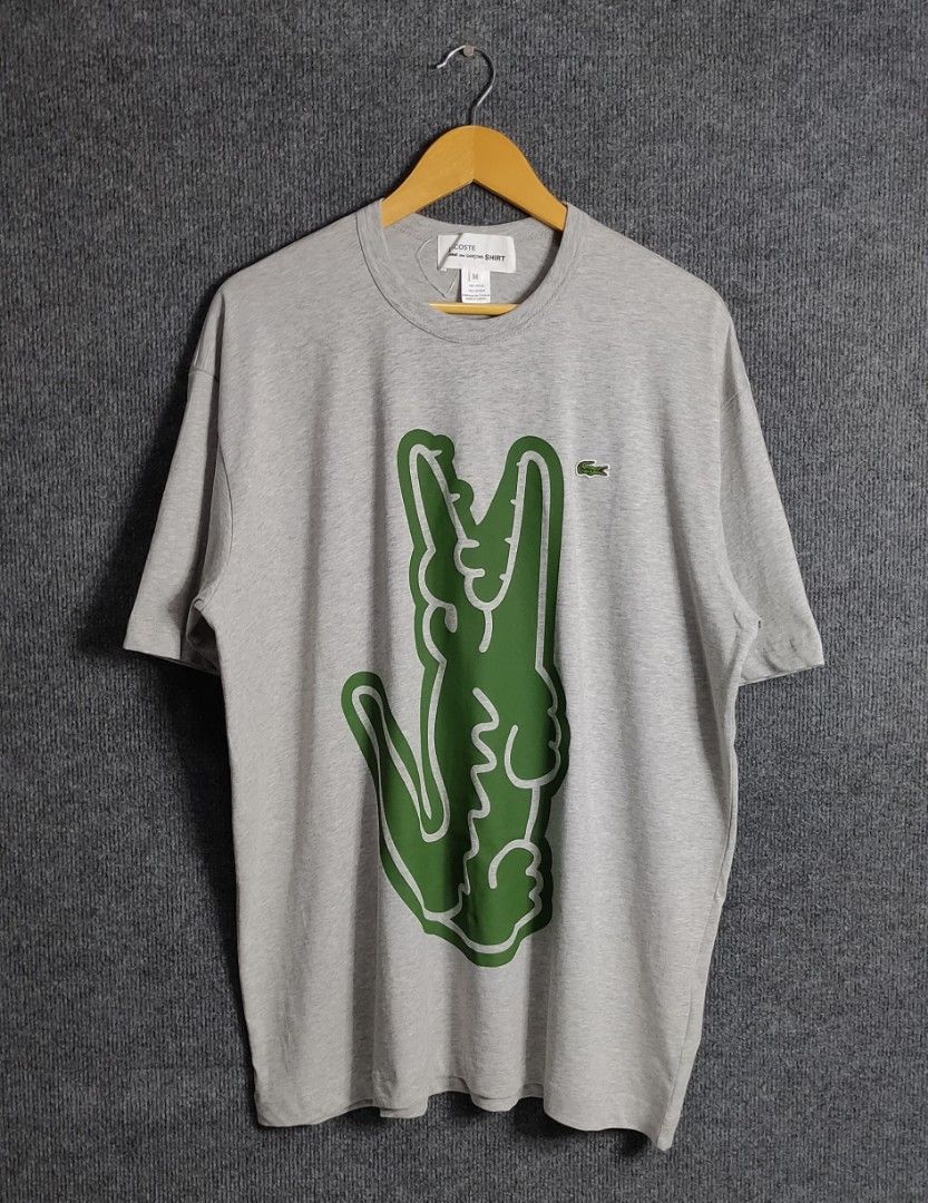 Lacoste x Comme des Garcons (Category: Luxury Apparel) located in Bolinao. Submitted by tokiya. (Listing ID 1454014961, Image 2). Description: LACOSTE x COMME des GARCONS BRAND NEW DEAD STOCK (Natanggal lang hang tag) Size XL fittings 24.5x31 Excellent Condition ‼️ No Issue ‼️.