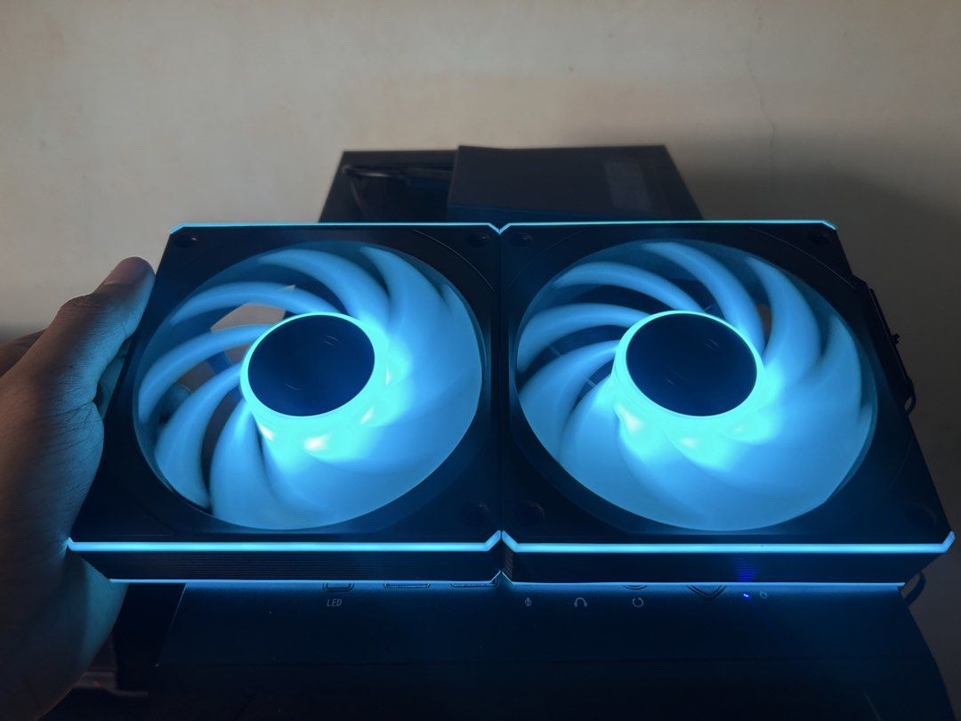 Lian Li wireless fans and Lian Li wireless controller (Category: Other Accessories) located in Batangas. Submitted by ror_3009 (Listing ID 1454178555, Image 3). Description: LIAN LI UNI FAN CL WIRELESS 120 - 2pcs ARGB fan - no issue - complete accessories LIANLI L - WIRELESS CONTROLLER - no issue - complete accessories RFS: Decluttering Sold as a set only.