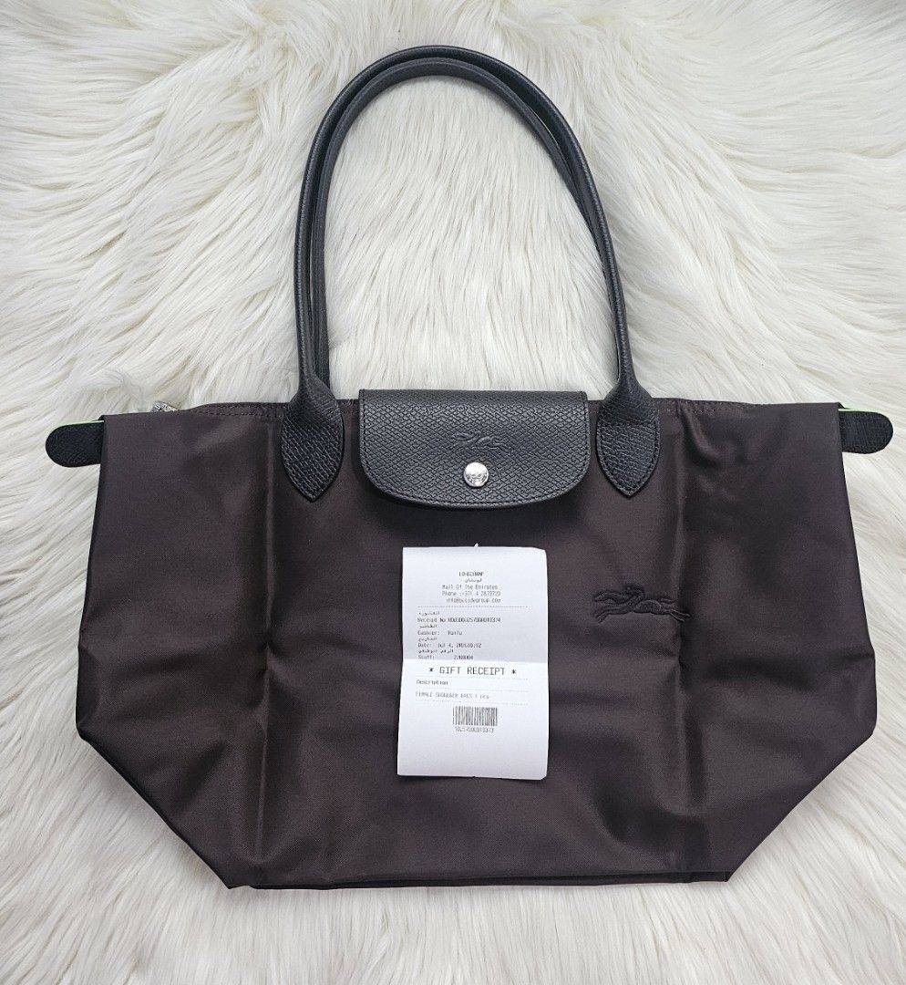Longchamp Le Pliage Shoulder Bag Burgundy (Category: Luxury Bags & Wallets) located in Cavite. Submitted by maeforbes031863 (Listing ID 1454108540, Image 2). Description: -Medium Long Handle - Authentic Longchamp Le Pliage Bag - Classic foldable design - Genuine leather handles and flap closure with snap button - Comes with original receipt - Ideal for everyday use and travel - Lightweight and easy to pack.