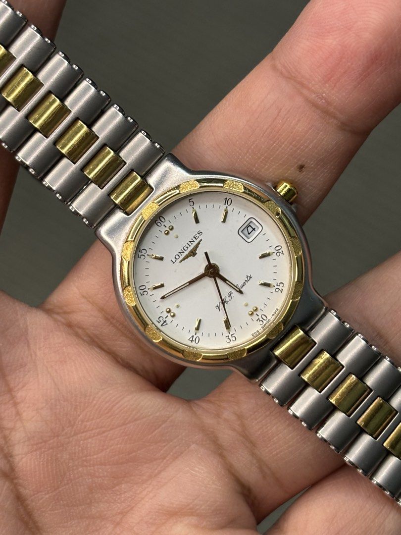 Longines Conquest V.H.P. Two Tone (Category: Luxury Watches) located in Manila. Submitted by soughtafterseconds (Listing ID 1454182739, Image 2). Description: Longines Conquest V.H.P. This Longines Conquest V.H.P. (Very High Precision) Two-Tone Ladies Watch (Ref. 4012 / Cal. L174 / ETA 255.561) is an exceptional piece of late-1980s to 1990s Swiss high-accuracy quartz horology, combining sport-luxury design with Longines’ pioneering V.H.P. technol