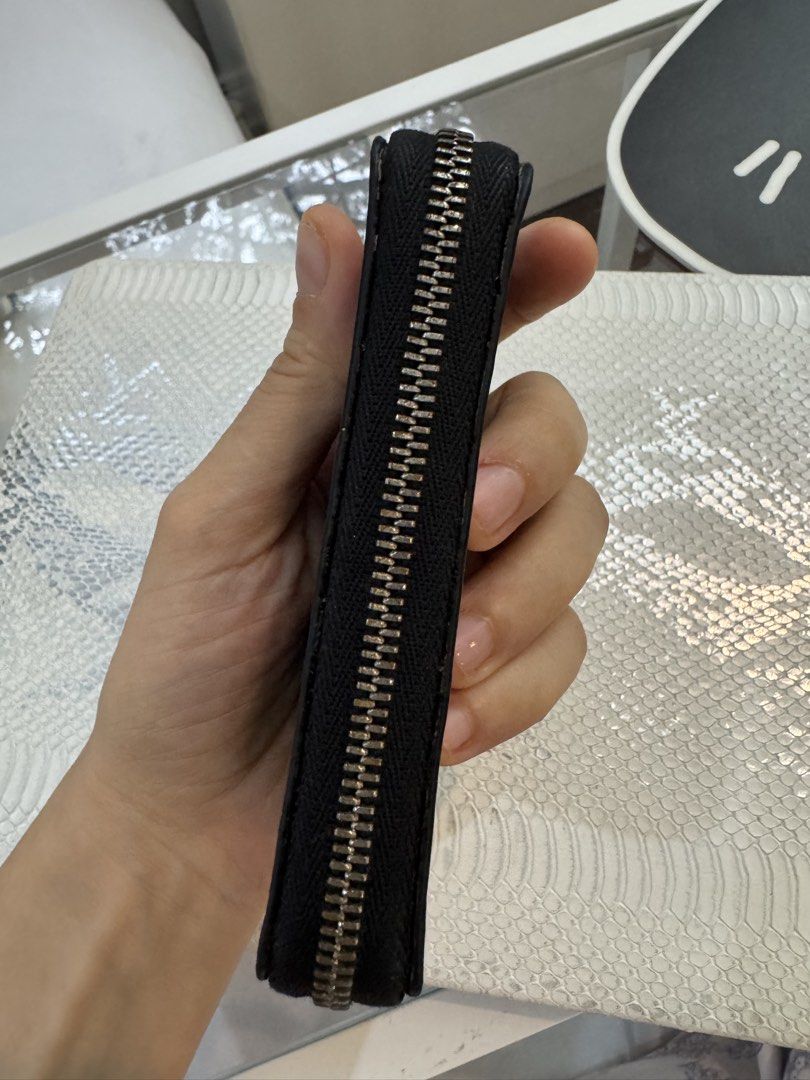 Louis Vuitton Damier Graphite Zippy Purse Vertical (Category: Luxury Bags & Wallets) located in Makati City. Submitted by m_mna (Listing ID 1454018753, Image 2). Description: Height: 2.75 in Length: 4.5 in Width: 0.75 in With box.