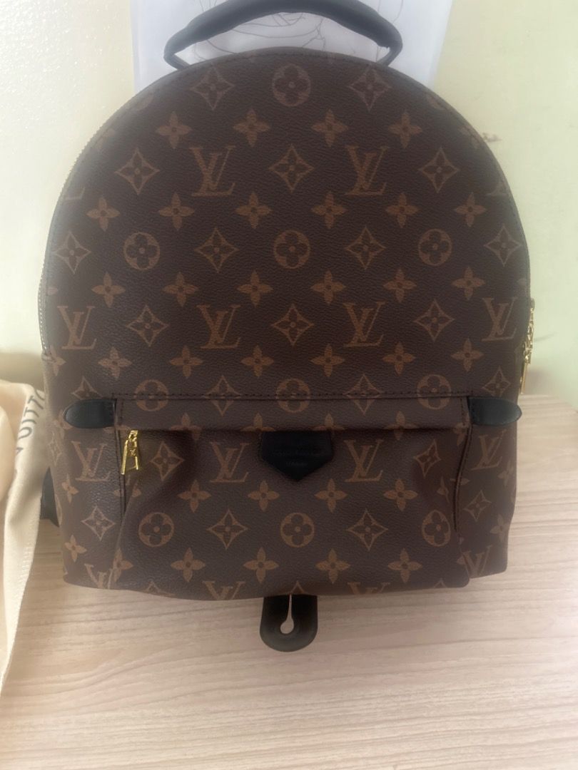 Louis Vuitton Monogram Backpack (Category: Luxury Bags & Wallets) located in Cebu City. Submitted by serene_simplicity (Listing ID 1454050462, Image 1). Description: - Classic Louis Vuitton monogram backpack - Color: Brown canvas with black leather trim - Gold zipper detail on front pocket - Top handle and adjustable shoulder straps - Ideal for everyday use or travel.