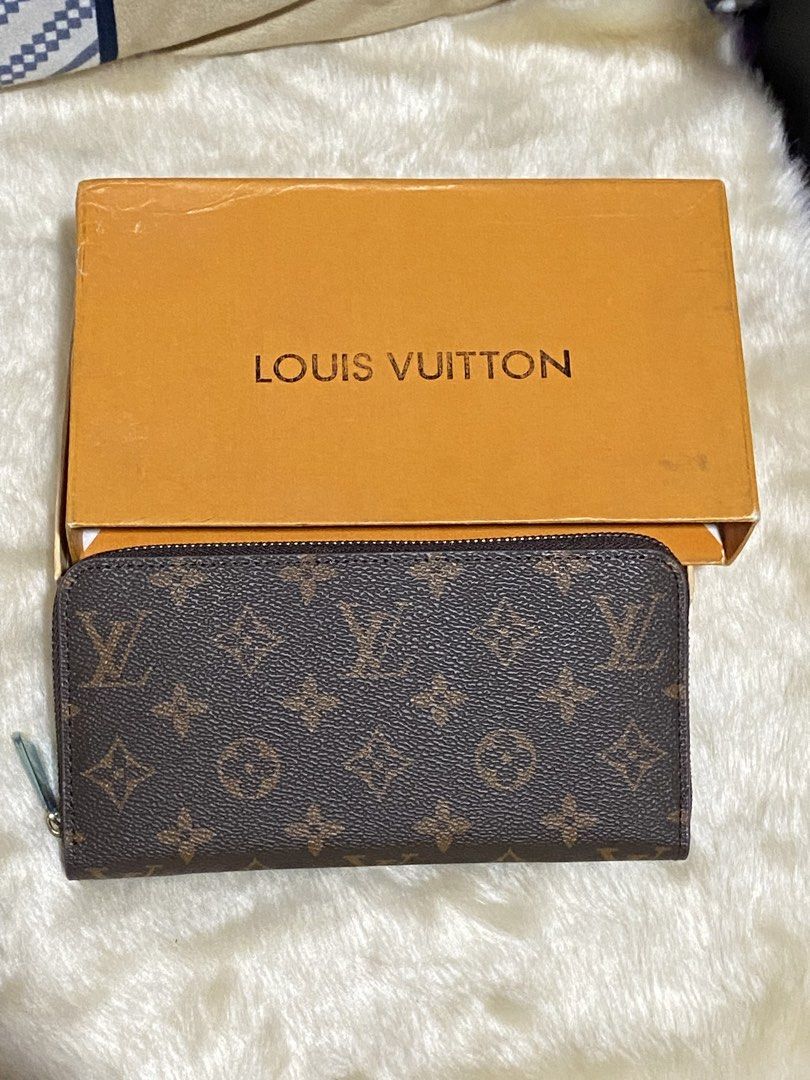 Louis Vuitton Monogram Zip Around Wallet (Category: Luxury Bags & Wallets) located in Manila. Submitted by yamskei04 (Listing ID 1454037225, Image 1). Description: - Authentic Louis Vuitton wallet - Classic monogram canvas - Secure zip-around closure - Multiple interior card slots - Zippered coin pocket - Comes with original Louis Vuitton box - Perfect for organizing your essentials.