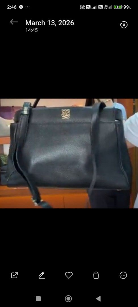 Louise Quatorze Black Leather Handbag (Category: Luxury Bags & Wallets) located in Manila. Submitted by liveeagle-c6d8 (Listing ID 1454135098, Image 1). Description: - Genuine black leather handbag - Features the iconic louise quatorze anagram logo in elegant gold hardware - Comes with a detachable shoulder strap for versatile carrying options - Structured silhouette for a polished look - Spacious interior, ideal for everyday essentials - Perfect