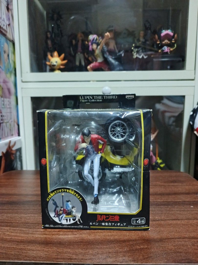 Lupin the Third Figure Collection Banpresto (Category: Figurines & Statues) located in Manila. Submitted by 3ks_toyhub (Listing ID 1454045554, Image 1). Description: - Banpresto Lupin the Third figure - Features Lupin on his iconic yellow motorcycle - Box shows other characters, hinting at a larger diorama set - Brand new and sealed box - Ideal collectible for any Lupin the Third enthusiast.
