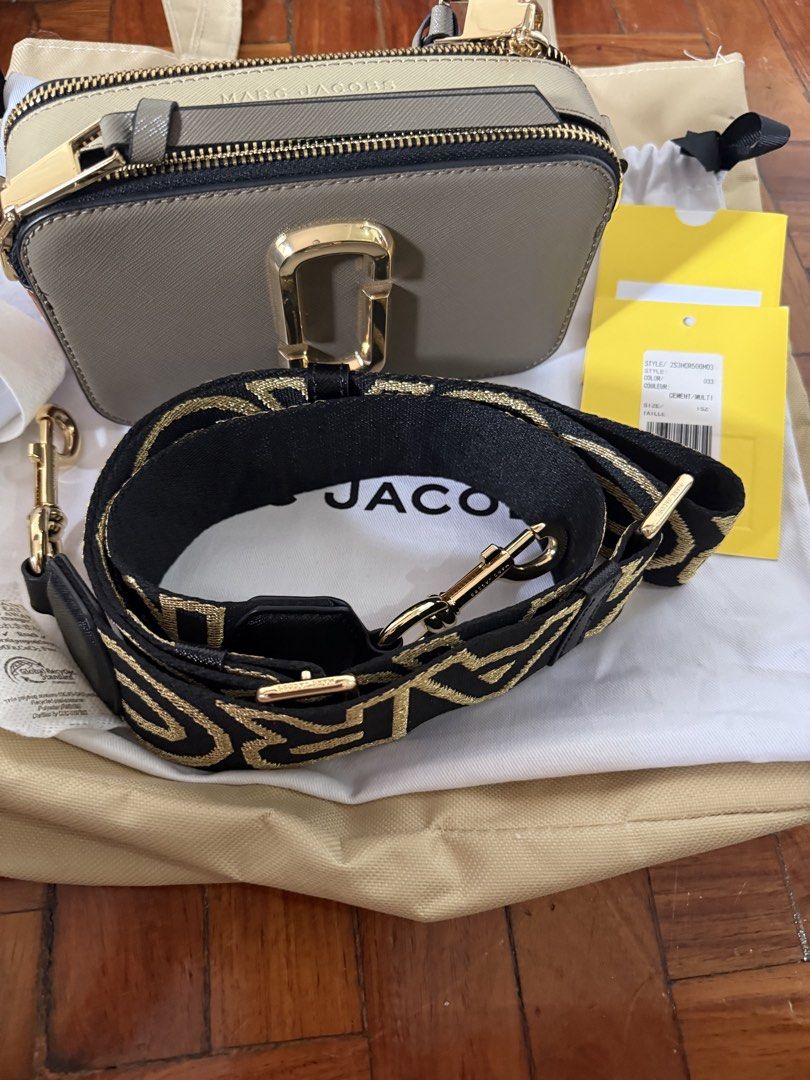 Marc Jacobs Snapshot Camera Bag (Category: Luxury Bags & Wallets) located in Quezon City. Submitted by msaisa (Listing ID 1454061156, Image 3). Description: - Authentic Marc Jacobs camera bag - Adjustable crossbody strap for comfortable wear - Elegant gold hardware details - Includes original dust bag and tags - Ideal for everyday essentials and style.