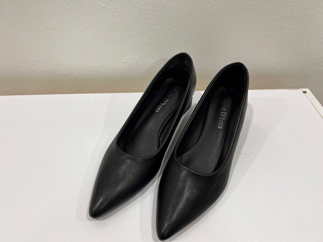 Mario d’ Boro black heels (Category: Heels) located in Manila. Submitted by threadtressure (Listing ID 1454102263, Image 1). Description: Mario d’ Boro black pumps size 8.5 (US). With tape residue at the back part due to heel protector used Condition: 7/10 Issues: Glue residue at the back part due to heel protector.