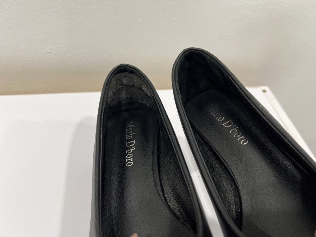 Mario d’ Boro black heels (Category: Heels) located in Manila. Submitted by threadtressure (Listing ID 1454102263, Image 3). Description: Mario d’ Boro black pumps size 8.5 (US). With tape residue at the back part due to heel protector used Condition: 7/10 Issues: Glue residue at the back part due to heel protector.