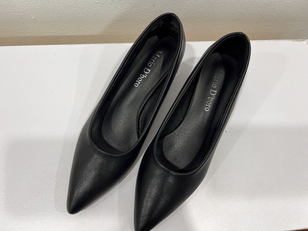 Mario d’ Boro black heels (Category: Heels) located in Manila. Submitted by threadtressure (Listing ID 1454102263, Image 2). Description: Mario d’ Boro black pumps size 8.5 (US). With tape residue at the back part due to heel protector used Condition: 7/10 Issues: Glue residue at the back part due to heel protector.