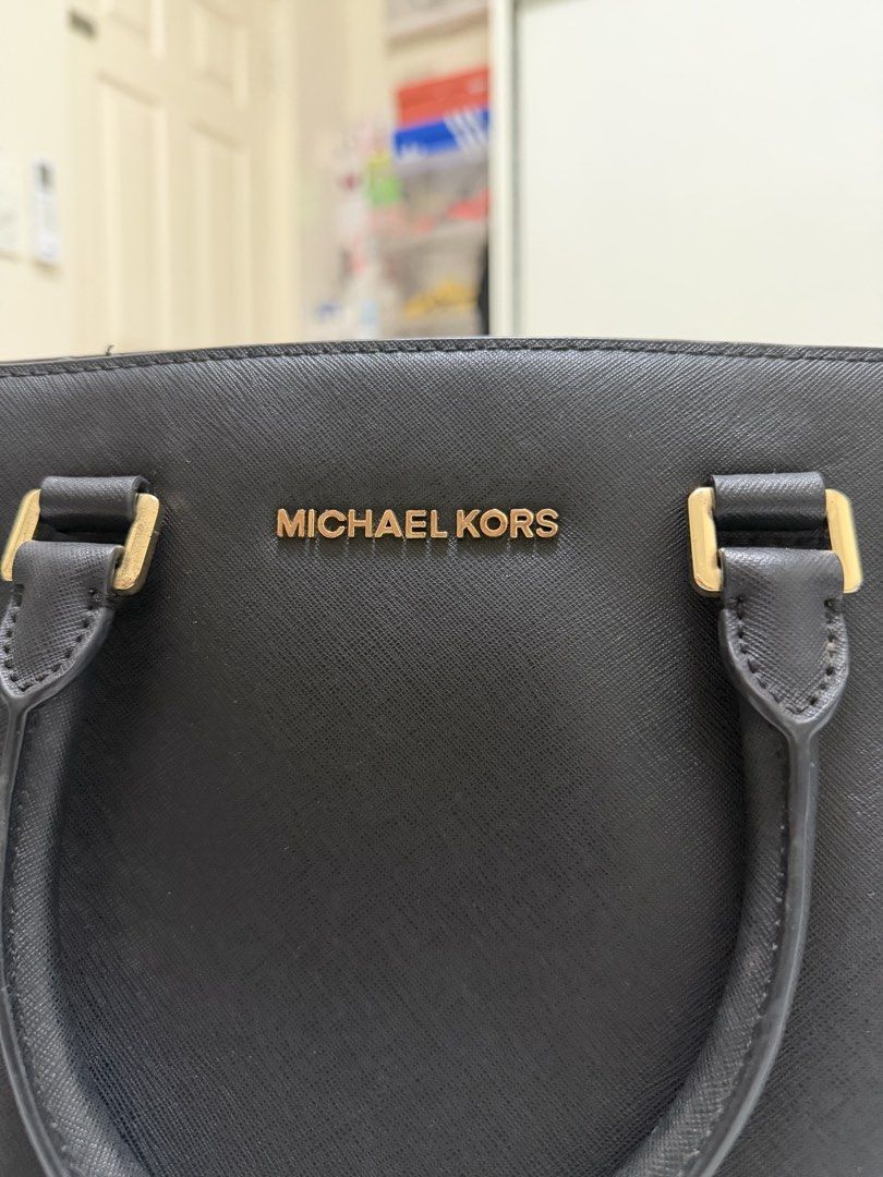 Michael Kors Black Leather Satchel Handbag (Category: Luxury Bags & Wallets) located in Makati City. Submitted by shimini (Listing ID 1454103608, Image 3). Description: - Genuine black leather Michael Kors satchel - Authentic - Bought in Japan - No issues Taguig/Makati.