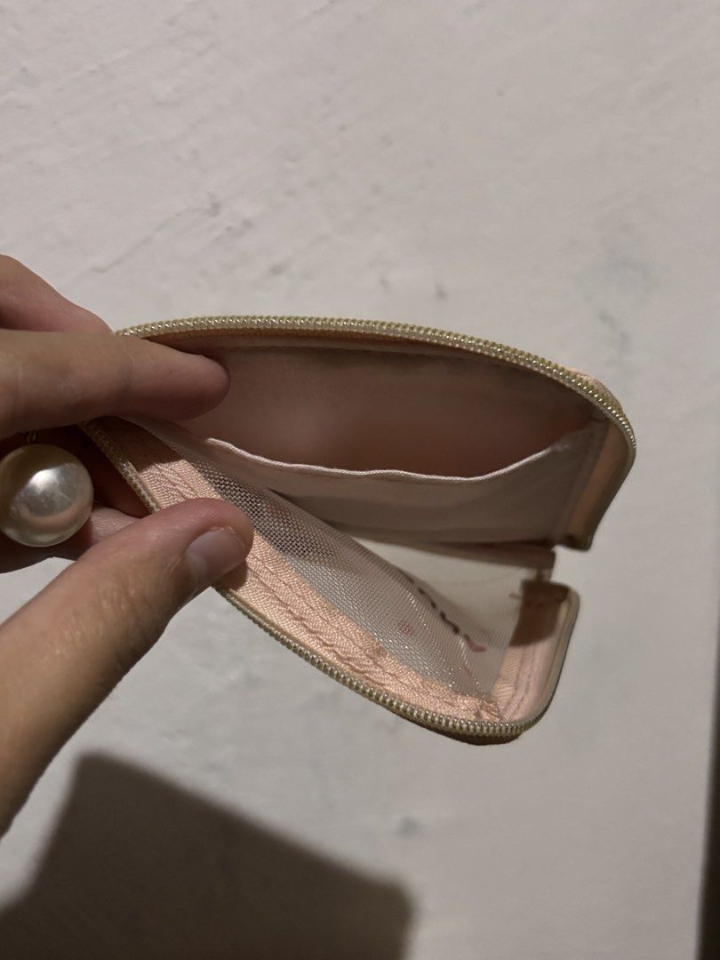 Miffy Mesh Pouch (Category: Purses & Pouches) located in Manila. Submitted by starrvx (Listing ID 1454166182, Image 2). Description: - theres a circular thingy inside (the broken thing for holding the lanyard) so it feels bulky inside - zipper is working, but kinda hard to pull - see photos for more details.