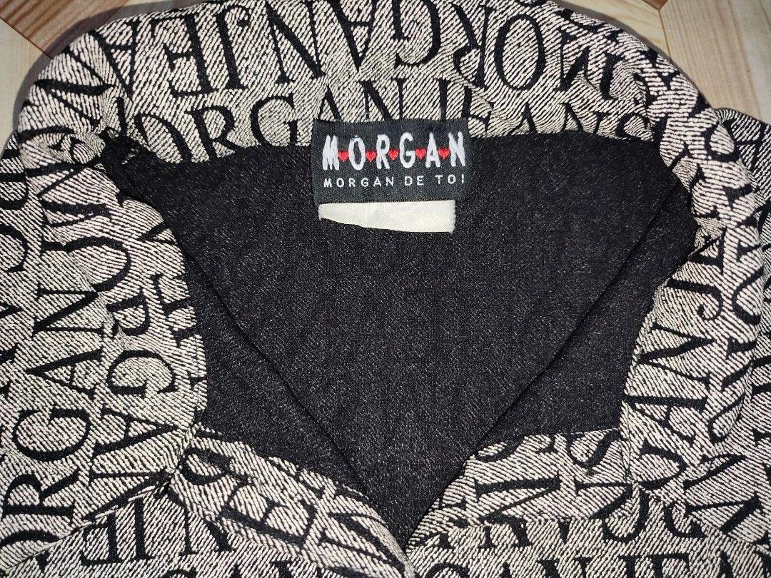 Morgan De Toi All Over Logo Print Button Up Jacket (Category: Coats, Jackets and Outerwear) located in Caloocan City. Submitted by faesrie (Listing ID 1454136885, Image 2). Description: - Morgan De Toi jacket - All-over logo print - Button-up front with collar - Long sleeves - Black and white pattern - Bold statement piece.