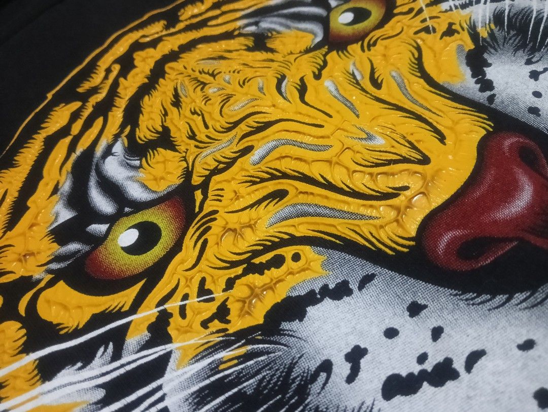 MY DREAM THAILAND TIGER FACE BLACK TEE (Category: Tshirts & Polo Shirts ) located in Davao. Submitted by nevar07 (Listing ID 1454107764, Image 3). Description: SIZE: MEDIUM DIMENSION: W18.5 X L26 DESIGN : Embossed or raised tiger graphic with detailed Thai-style ornamental patterns FABRIC: COTTON COLOR RATE: 9.5/10 READY TO WEAR NO ISSUE DM TO PURCHASE 📥 𝐑𝐄𝐌𝐈𝐍𝐃𝐄𝐑: •𝐂𝐨𝐥𝐨𝐫 𝐦𝐚𝐲 𝐯𝐚𝐫𝐲 𝐝𝐮𝐞 𝐨𝐟 𝐭𝐡𝐞 𝐥𝐢𝐠𝐡𝐭𝐢𝐧𝐢𝐧𝐠 •𝐀𝐥�