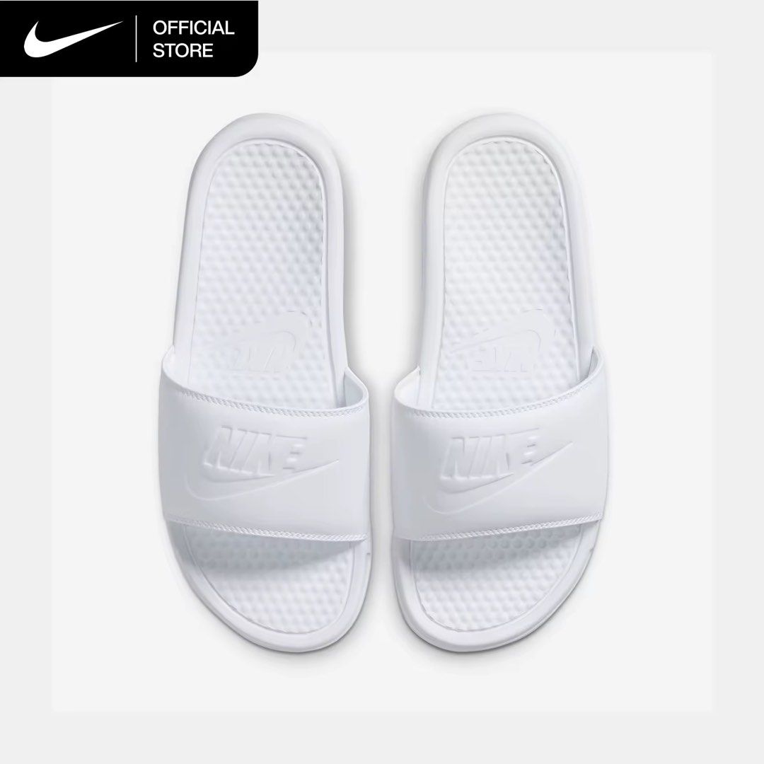 Nike Benassi Just Do It White Slides (Category: Slippers & Slides) located in Mandaluyong City. Submitted by annezoe (Listing ID 1454158879, Image 1). Description: -Brand new and Legit -Srp 1,695, selling for only 1,000 - Easy slip-on design - Embossed Nike logo on strap - Textured footbed for enhanced comfort - Ideal for casual wear or post-sport recovery - Simple and versatile style.