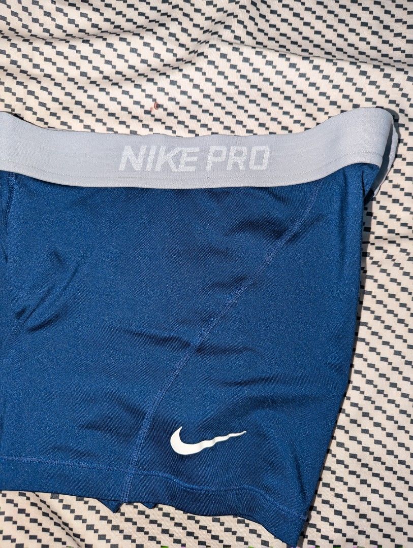 Nike Pro Dri-FIT Compression Shorts Navy Blue (Category: Activewear) located in Manila. Submitted by booksandbeyond (Listing ID 1454020199, Image 2). Description: - Navy blue Nike Pro compression shorts - Dri-FIT material keeps you dry - Elastic waistband with Nike Pro branding - Ideal for workouts and sports - Provides a comfortable and supportive fit.