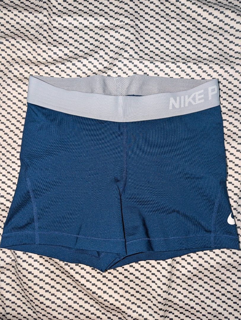 Nike Pro Dri-FIT Compression Shorts Navy Blue (Category: Activewear) located in Manila. Submitted by booksandbeyond (Listing ID 1454020199, Image 1). Description: - Navy blue Nike Pro compression shorts - Dri-FIT material keeps you dry - Elastic waistband with Nike Pro branding - Ideal for workouts and sports - Provides a comfortable and supportive fit.