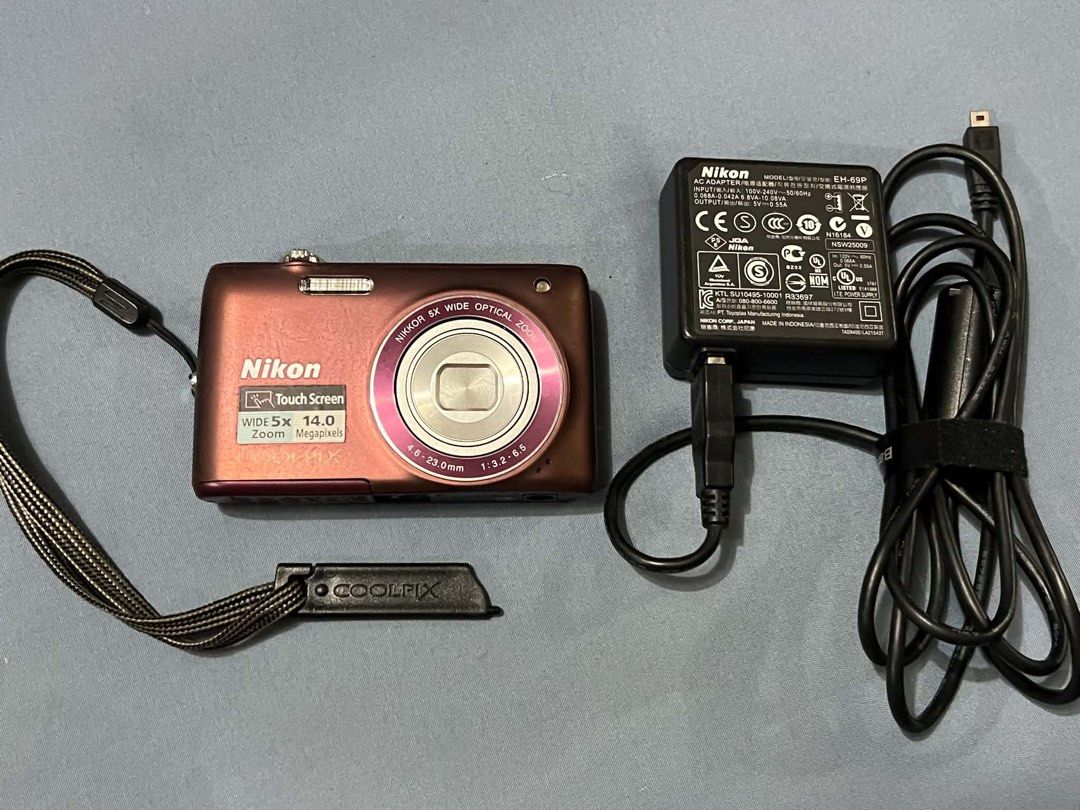 Nikon Coolpix S4100 Touchscreen Plum color (Category: Cameras) located in Pasig City. Submitted by trendsinstyle (Listing ID 1454099769, Image 3). Description: - Nikon Coolpix S4100 Touchscreen Digital Camera (Plum) - 14.0 Megapixel Sensor - 5x Optical Zoom Inclusions: - Original Nikon Charger and Battery - Original Nikon wrist strap and touch stylus pen -Battery working and charging properly Flaws/Issue: lcd screen burn but does not affect the p