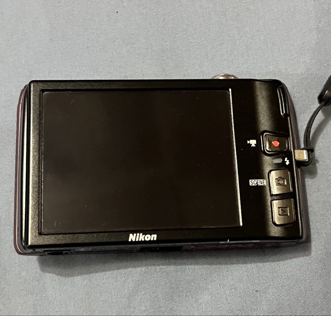 Nikon Coolpix S4100 Touchscreen Plum color (Category: Cameras) located in Pasig City. Submitted by trendsinstyle (Listing ID 1454099769, Image 2). Description: - Nikon Coolpix S4100 Touchscreen Digital Camera (Plum) - 14.0 Megapixel Sensor - 5x Optical Zoom Inclusions: - Original Nikon Charger and Battery - Original Nikon wrist strap and touch stylus pen -Battery working and charging properly Flaws/Issue: lcd screen burn but does not affect the p