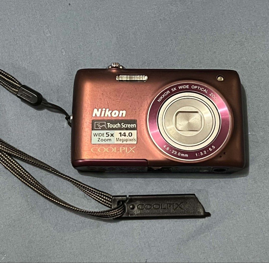 Nikon Coolpix S4100 Touchscreen Plum color (Category: Cameras) located in Pasig City. Submitted by trendsinstyle (Listing ID 1454099769, Image 1). Description: - Nikon Coolpix S4100 Touchscreen Digital Camera (Plum) - 14.0 Megapixel Sensor - 5x Optical Zoom Inclusions: - Original Nikon Charger and Battery - Original Nikon wrist strap and touch stylus pen -Battery working and charging properly Flaws/Issue: lcd screen burn but does not affect the p