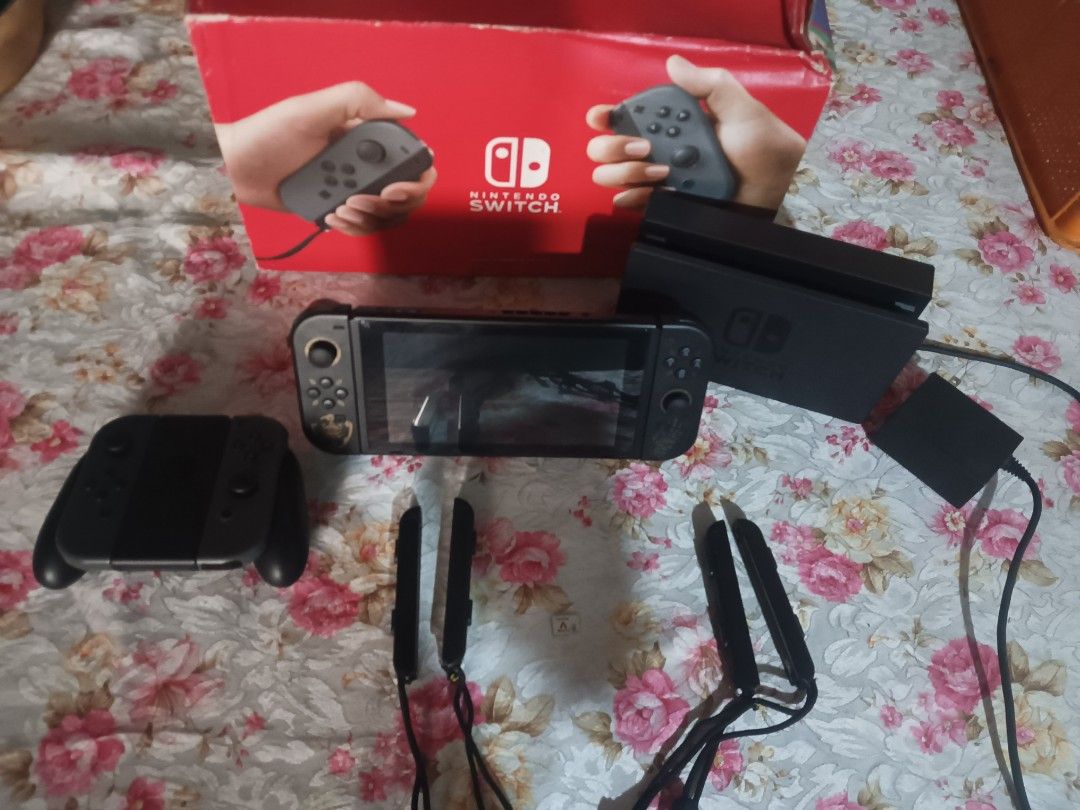 Nintendo Switch V2 Complete Set + Extras (Category: Nintendo) located in Tarlac. Submitted by silverskye10829 (Listing ID 1454185148, Image 2). Description: ✅ Console in great condition ✅ No screen cracks ✅ No display issues or glitches ✅ Original Joy-Cons with no drift ✅ Extra pair of Joy-Cons, also with no drift ✅ Original box ✅ Dock ✅ Charger ✅ HDMI ✅ 128GB microSD card ✅ Joy-Con Grip ✅ Wrist straps (4x).