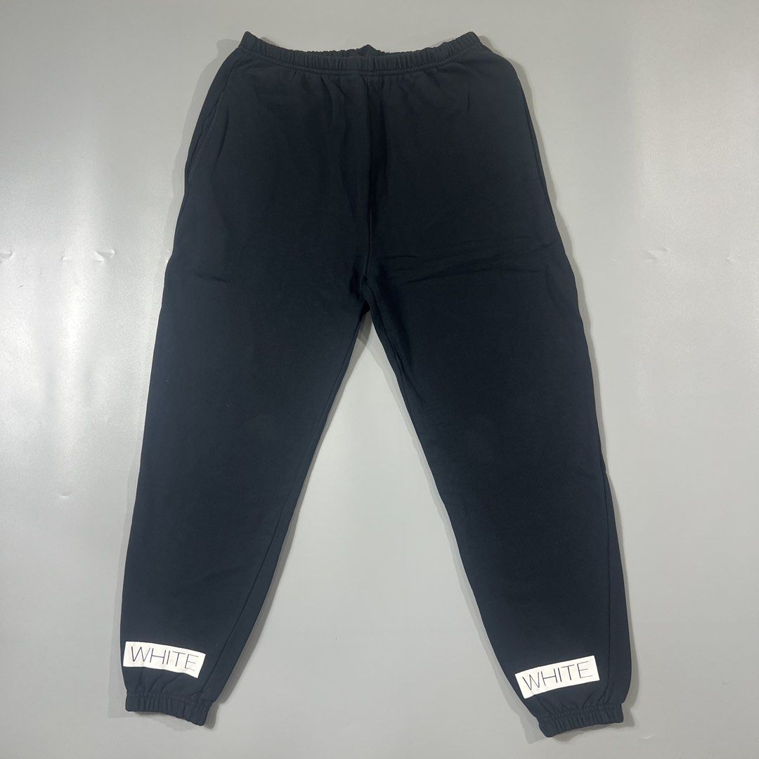 OFF-WHITE c/o Virgil Abloh "BLUE COLLAR" Diagonal Stripe Sweatpants (Category: Joggers) located in Baguio. Submitted by pinkpixie (Listing ID 1454153389, Image 2). Description: Authentic - Iconic diagonal stripes on legs - "BLUE COLLAR" text detail on left leg - Elastic waistband with drawstring - Ribbed cuffs - Comfortable fit.