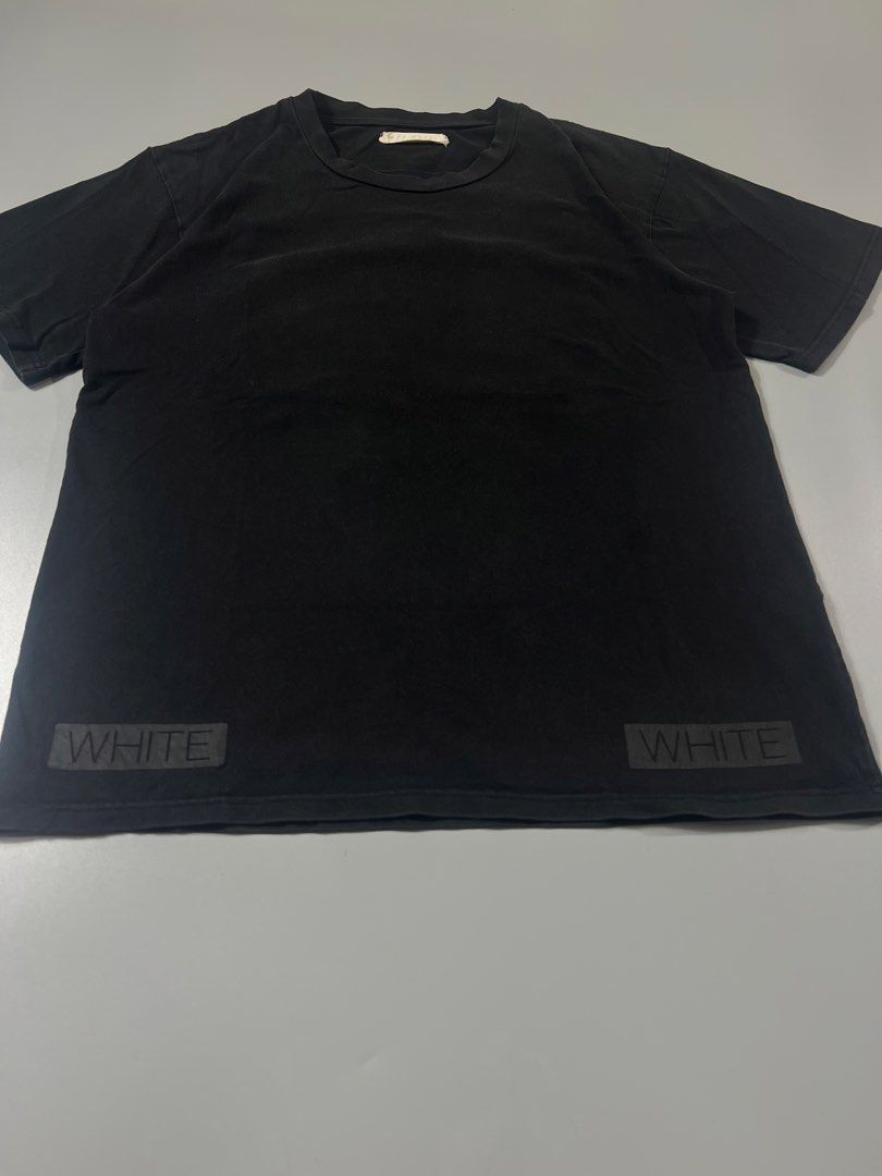 Off-White tee (Category: Tshirts & Polo Shirts ) located in Baguio. Submitted by pinkpixie (Listing ID 1454153229, Image 3). Description: Authentic - Black OFF-WHITE T-shirt - Iconic diagonal stripes graphic on the back - Orange "WHITE" box logo on the back - "WHITE" branding on the front hem - Made from good quality cotton - Essential for any streetwear collection.