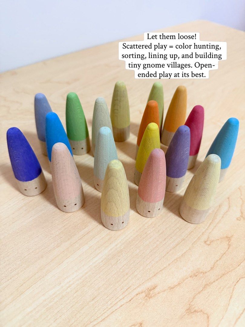 Pastel Cone Gnomes (Category: Kids Toys) located in Pasig City. Submitted by timberthinksph (Listing ID 1454144606, Image 2). Description: Hello, little gnomies! 🌈👋 20 wooden cone gnomes in soft pastel + bright rainbow tips. From deep violet to baby pink, lemon to sky blue — every piece is a different color! Perfect for color sorting, counting, small world play, and adding a pop of color to any sensory bin. Which little gnome would you pick fir