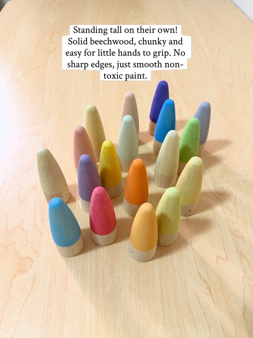 Pastel Cone Gnomes (Category: Kids Toys) located in Pasig City. Submitted by timberthinksph (Listing ID 1454144606, Image 3). Description: Hello, little gnomies! 🌈👋 20 wooden cone gnomes in soft pastel + bright rainbow tips. From deep violet to baby pink, lemon to sky blue — every piece is a different color! Perfect for color sorting, counting, small world play, and adding a pop of color to any sensory bin. Which little gnome would you pick fir
