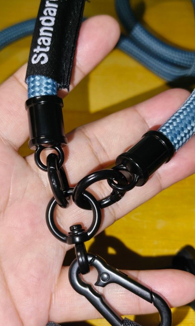 PHONE HOLDER STRAP SET STANDARD BRAND (Category: Mounts & Holders) located in Rizal. Submitted by baltiq (Listing ID 1454180545, Image 3). Description: 2pcs. CP Holder straps 👉great travel buddy! thick & durable 📌STANDARD Brand from Japan 📌2pcs. cp holder(see pics) 📌adjustable steel blue thick strap 10mm, black hardwares 📌with small hook included, pwedeng pagsabitan ng coin purse, shades etc. 💰MOP: GCash.