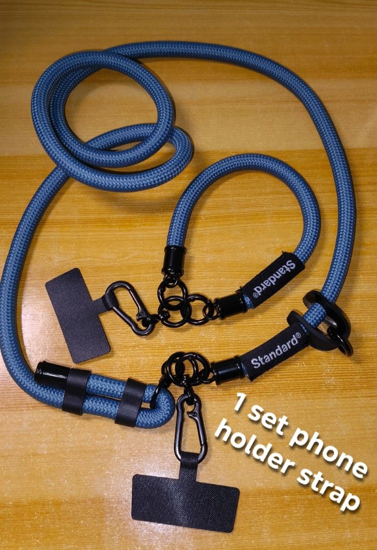 PHONE HOLDER STRAP SET STANDARD BRAND (Category: Mounts & Holders) located in Rizal. Submitted by baltiq (Listing ID 1454180545, Image 1). Description: 2pcs. CP Holder straps 👉great travel buddy! thick & durable 📌STANDARD Brand from Japan 📌2pcs. cp holder(see pics) 📌adjustable steel blue thick strap 10mm, black hardwares 📌with small hook included, pwedeng pagsabitan ng coin purse, shades etc. 💰MOP: GCash.