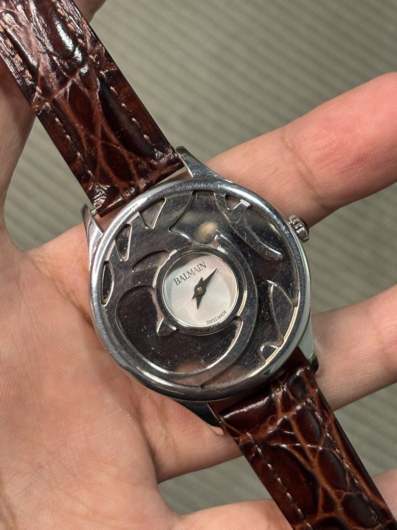 Pierre Balmain “Arabesques” Skeleton-Overlay Watch (Category: Luxury Watches) located in Manila. Submitted by soughtafterseconds (Listing ID 1454126258, Image 2). Description: Pierre Balmain “Arabesques” Skeleton-Overlay Watch This Pierre Balmain “Arabesques” Skeleton-Overlay Watch (Ref. 1911) is an extraordinary piece of Swiss-made Parisian haute couture horology. Featuring Pierre Balmain’s signature arabesque motif integrated directly into the 