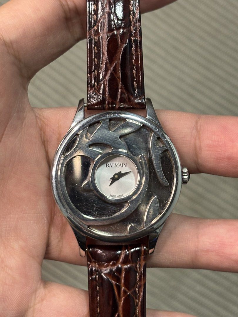 Pierre Balmain “Arabesques” Skeleton-Overlay Watch (Category: Luxury Watches) located in Manila. Submitted by soughtafterseconds (Listing ID 1454126258, Image 1). Description: Pierre Balmain “Arabesques” Skeleton-Overlay Watch This Pierre Balmain “Arabesques” Skeleton-Overlay Watch (Ref. 1911) is an extraordinary piece of Swiss-made Parisian haute couture horology. Featuring Pierre Balmain’s signature arabesque motif integrated directly into the 