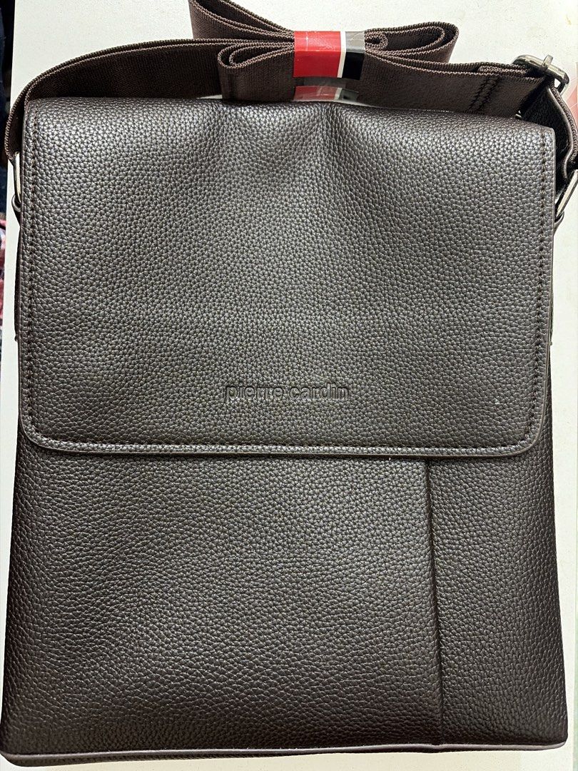 Pierre Cardin Brown Leather Messenger Bag (Category: Sling Bags) located in Cebu City. Submitted by trilriv (Listing ID 1454006702, Image 1). Description: - Brand New Genuine Pierre Cardin brown leather messenger bag - Secure flap closure with embossed brand name - Multiple interior compartments for organization - Internal zippered pocket for valuables - Adjustable strap for comfortable wear - Ideal for everyday use.