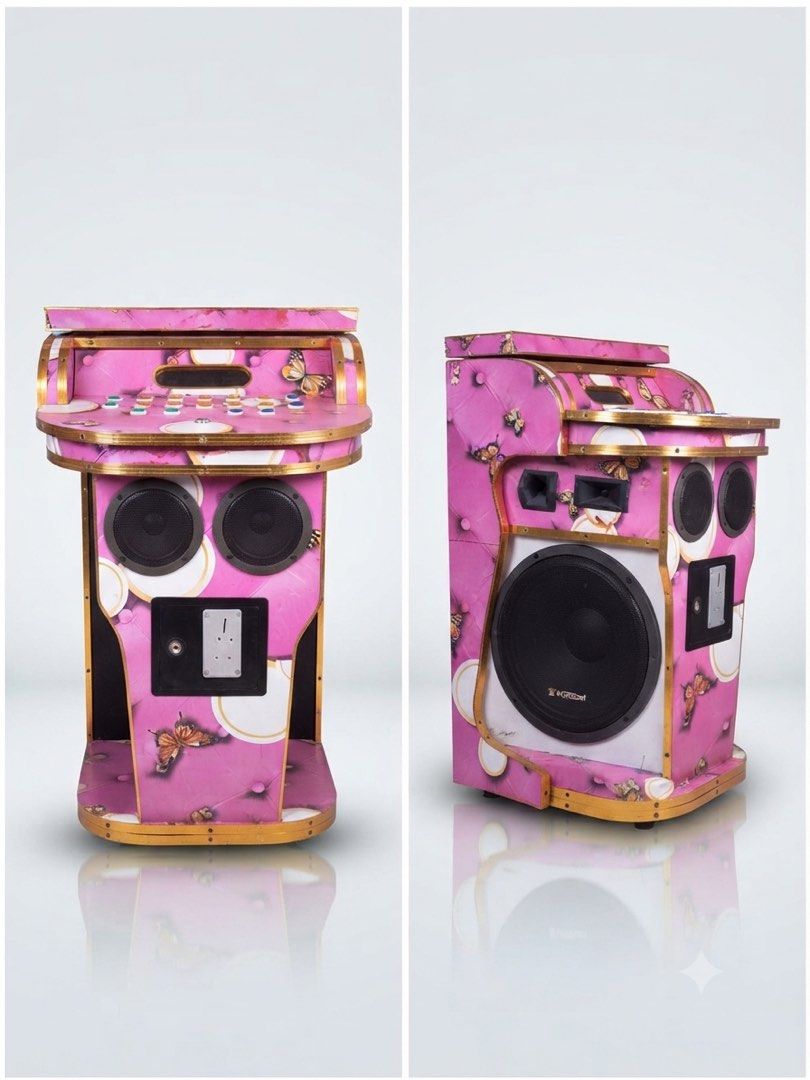 Pink Butterfly Karaoke Machine with Speakers (Category: Soundbars, Speakers & Amplifiers) located in Paranaque City. Submitted by sunnycloud_ (Listing ID 1454107327, Image 1). Description: - Fun pink karaoke machine - Decorated with butterflies and tufted details - Two speakers on the front - Large speaker on the side - Control panel located at the top - Ideal for parties and home entertainment - Ready for your next singing session!.