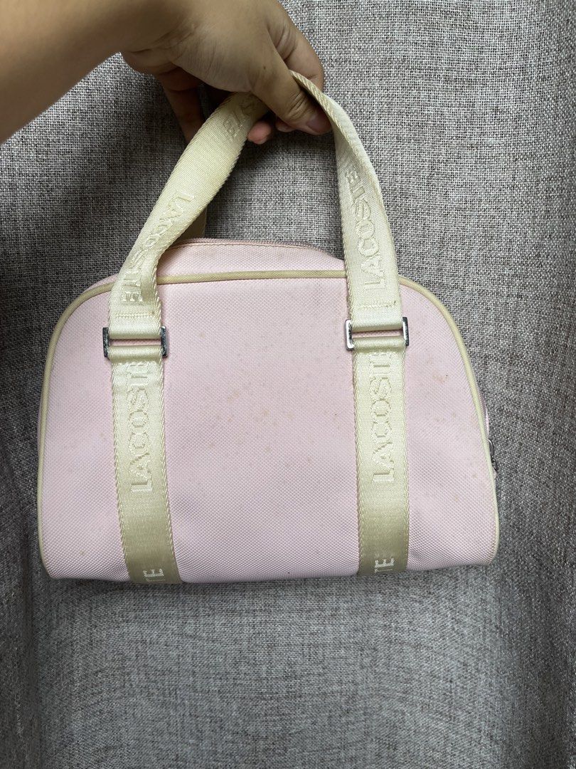 Pink Lacoste Mini Boston Bag (Category: Luxury Bags & Wallets) located in Paniqui. Submitted by vanillacat_bella (Listing ID 1454054418, Image 1). Description: Cute pink mini Lacoste boston bag with logo straps. Perfect for essentials and casual outings..