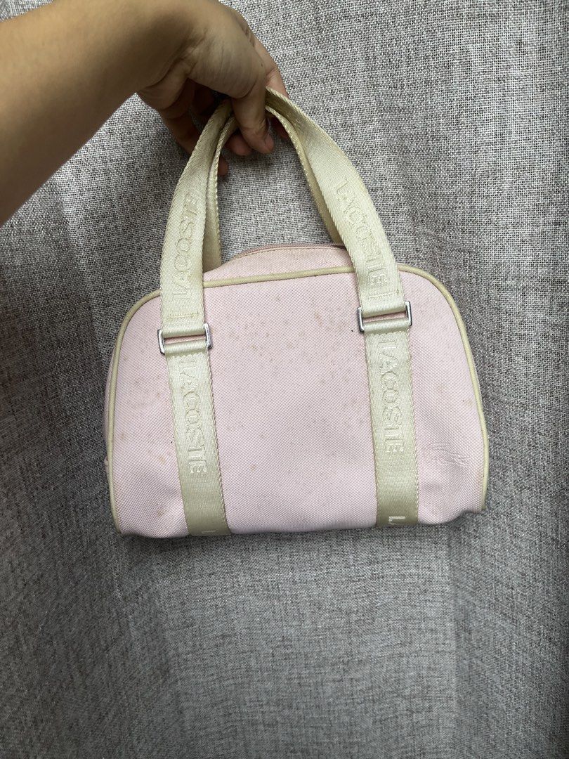Pink Lacoste Mini Boston Bag (Category: Luxury Bags & Wallets) located in Paniqui. Submitted by vanillacat_bella (Listing ID 1454054418, Image 2). Description: Cute pink mini Lacoste boston bag with logo straps. Perfect for essentials and casual outings..