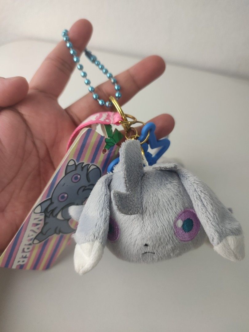 Pokemon Center Nyasper Plush Keychain (Category: Plushies & Soft Toys) located in Manila. Submitted by epicmountain-f20453 (Listing ID 1454100799, Image 1). Description: - Authentic Nyasper (Persian) plush keychain from the Pokemon Center - Adorable blue star charm included - Comes with a beaded chain for easy attachment - Perfect accessory for bags, backpacks, or keys - Imported directly from Japan.