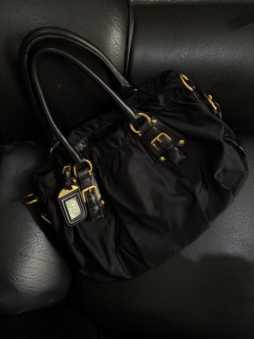 Prada Tessuto Gaufre (Ruched/Gathered) (Category: Luxury Bags & Wallets) located in Enrique B. Magalona (Saravia). Submitted by jmjnsyxrealvntg (Listing ID 1454135788, Image 3). Description: Authentic Prada Almost Brand new No issue .