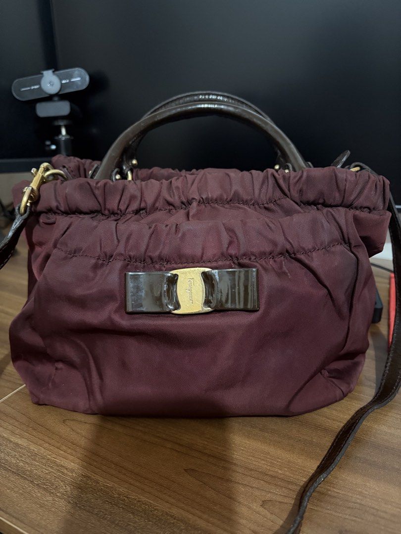 Preloved Ferragamo Bag (Category: Luxury Bags & Wallets) located in Manila. Submitted by JAngel (Listing ID 1454138917, Image 1). Description: Preloved Nylon type with patent Original With flaws Buy at your own risk No return, No Refund As is where is.