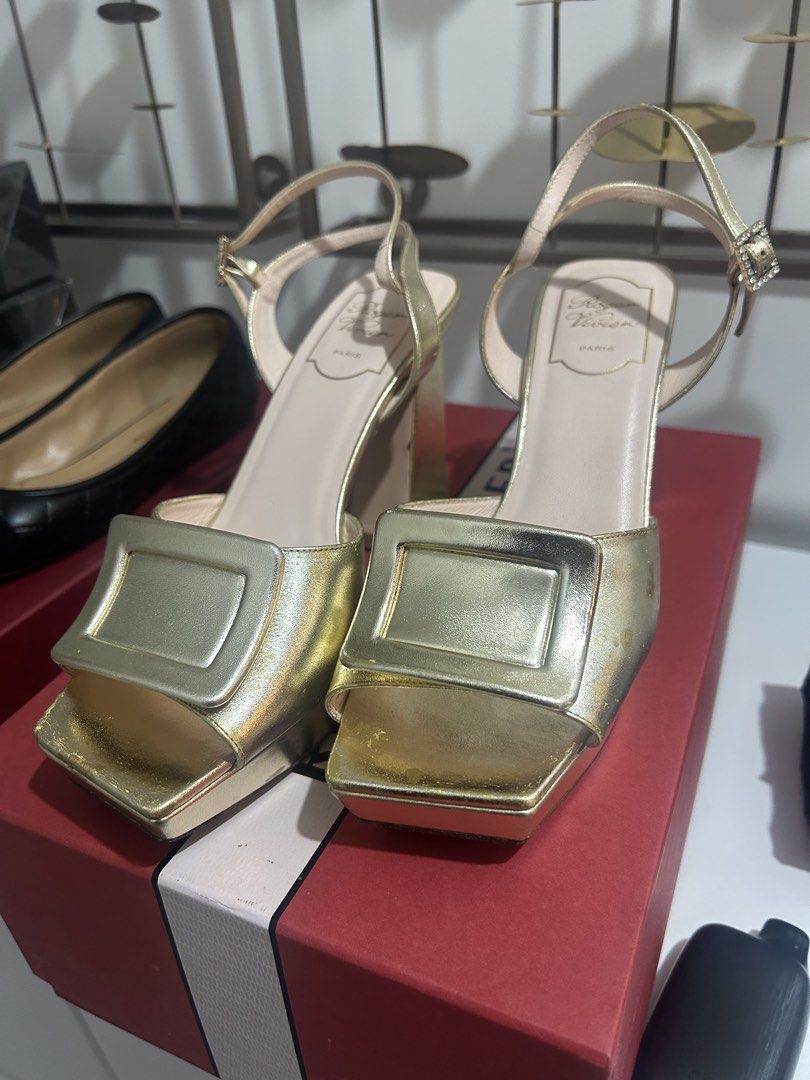 Preloved size 38 Roger Vivier platform sandals (Category: Sneakers & Footwear) located in Pasig City. Submitted by imeldas (Listing ID 1454026423, Image 3). Description: Personally used RV sandals in gold Has some minor discoloration but noticeable when used. Perfect for formal occasions! .